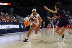 Syracuse guard Alaina Rice drives right on Arizona's Jada Williams during SU's 74-69 NCAA Tournament first-round victory over the Wildcats. 